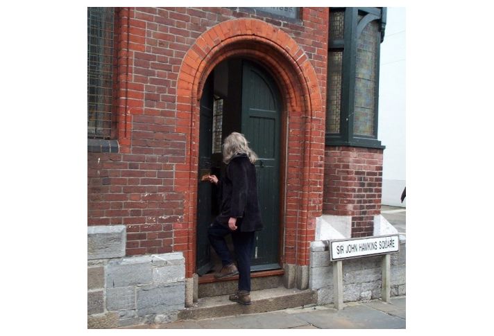 Robert entering The Mission Hall in Sir John Hawkins Square to view the works for the first time, 2000.